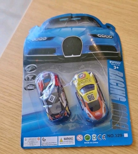 Boys racing model cars - racing,